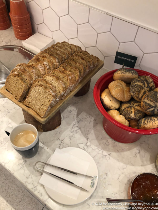 a tray of bread and a bowl of bread
