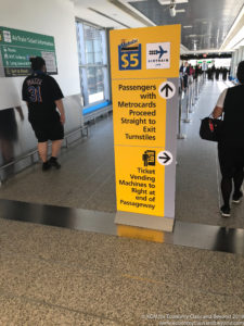 a yellow sign in a airport