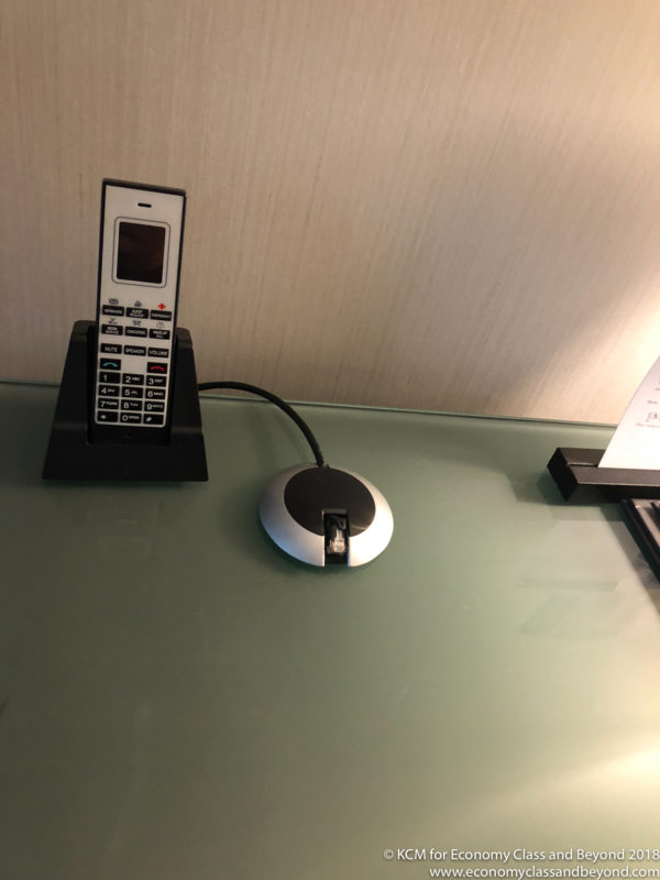 a cordless phone on a desk
