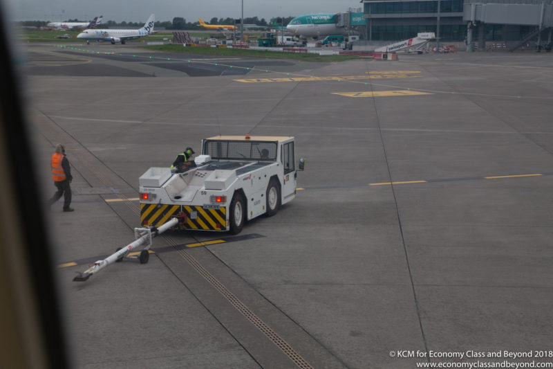 a tow truck on the tarmac