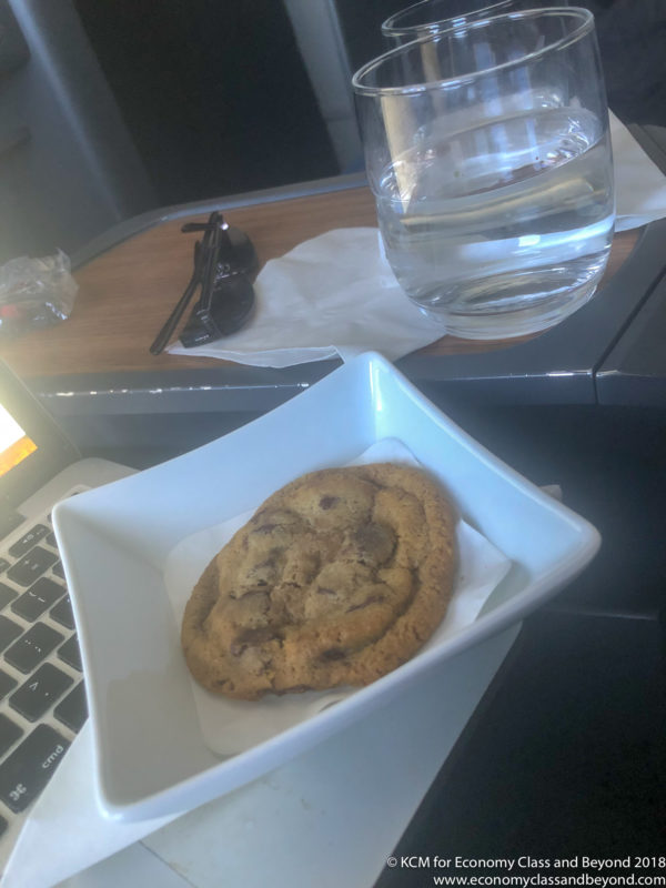a cookie in a square bowl on a table