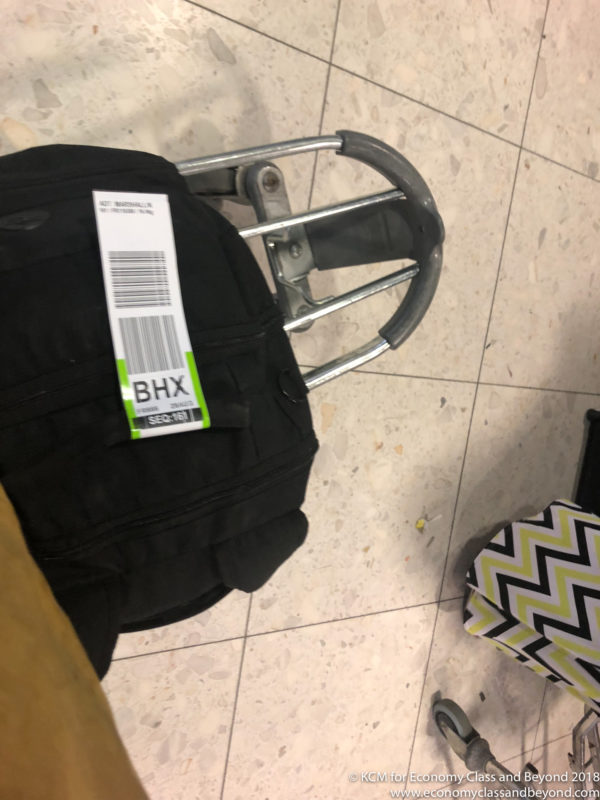 a luggage bag on a cart