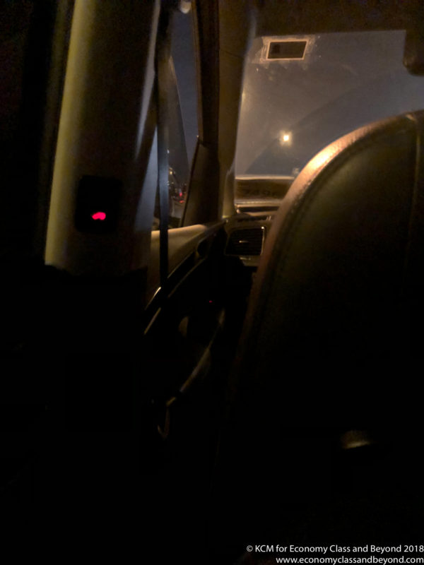 a car interior with a red light