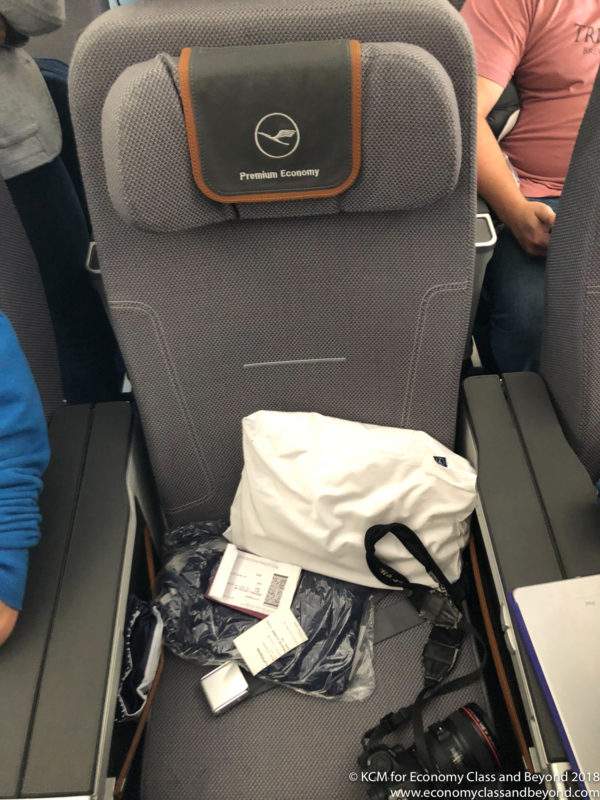 a seat with a bag and a bag on it
