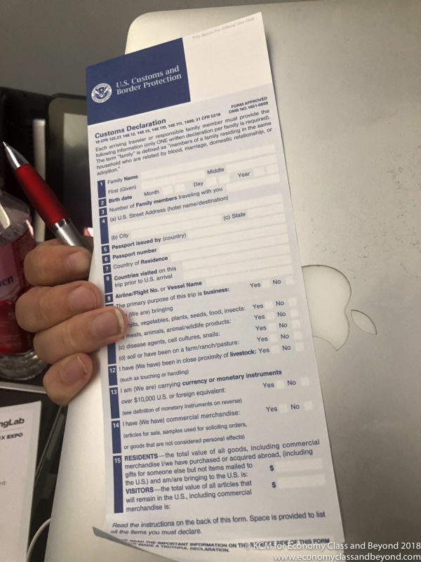 a hand holding a document