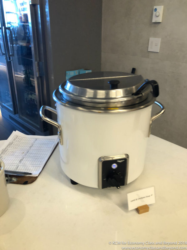 a white and silver crock pot