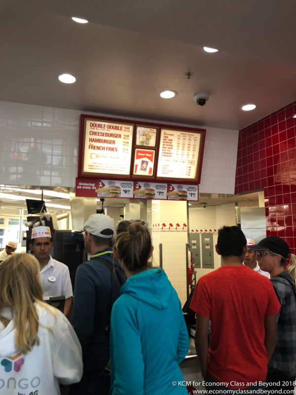 a group of people in a fast food restaurant