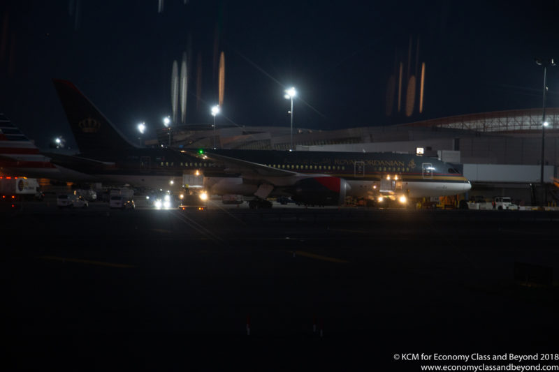 a plane on the runway at night