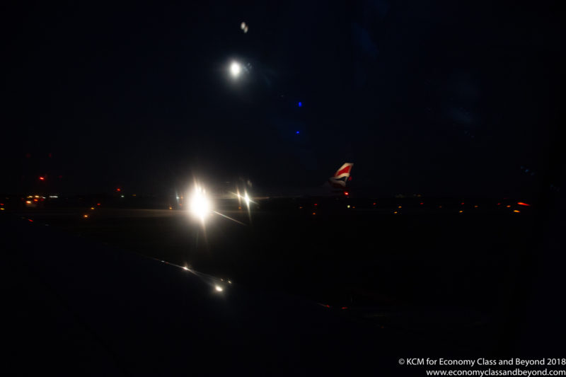 a plane at night with bright lights