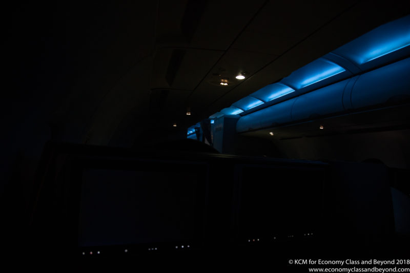a dark room with a blue light