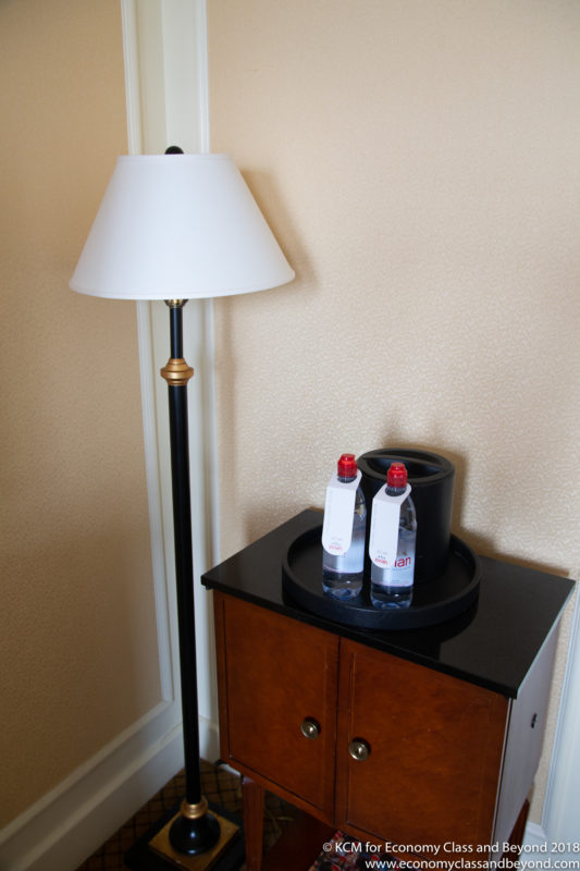 a lamp next to a table