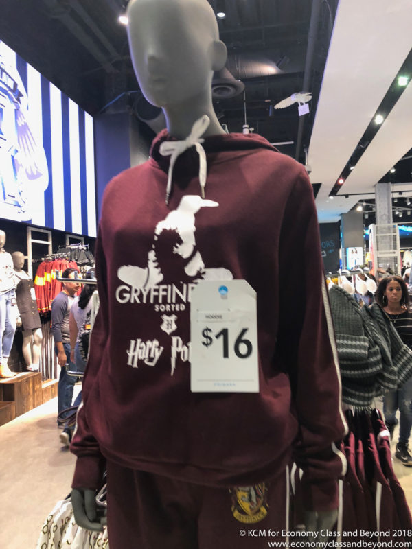 a mannequin wearing a hoodie with a price tag