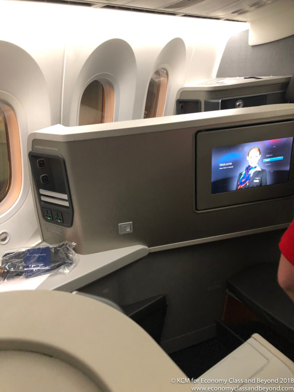 a tv on the side of a plane