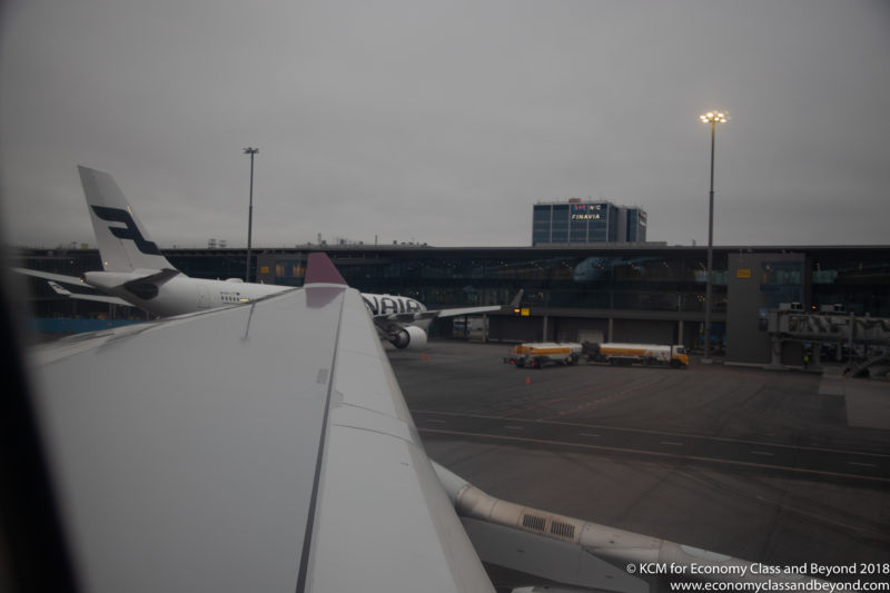 an airplane wing in a terminal