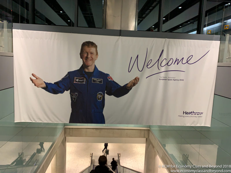 a large banner with a man in a blue suit