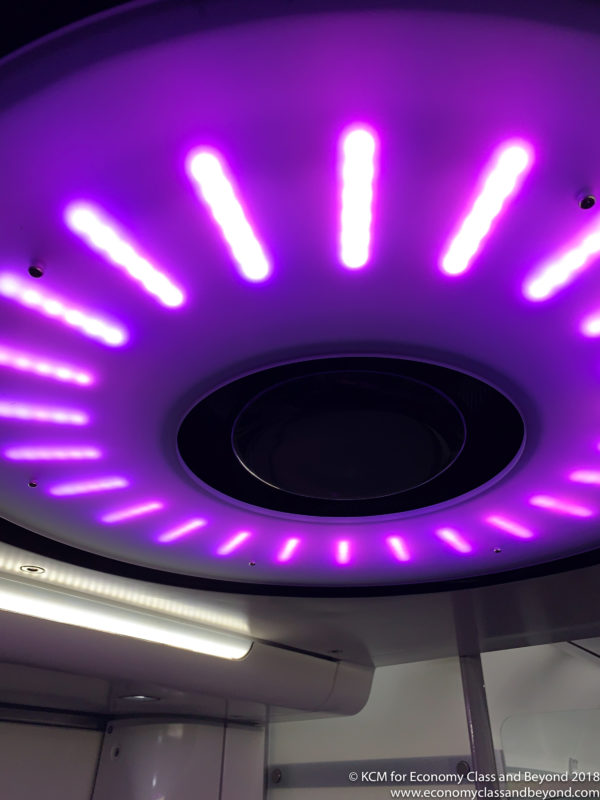 a purple light on a ceiling