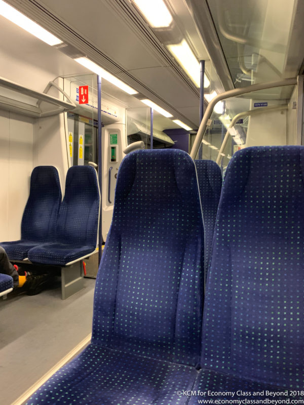 a blue seats on a train