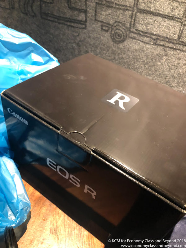 a black box with a white logo on it
