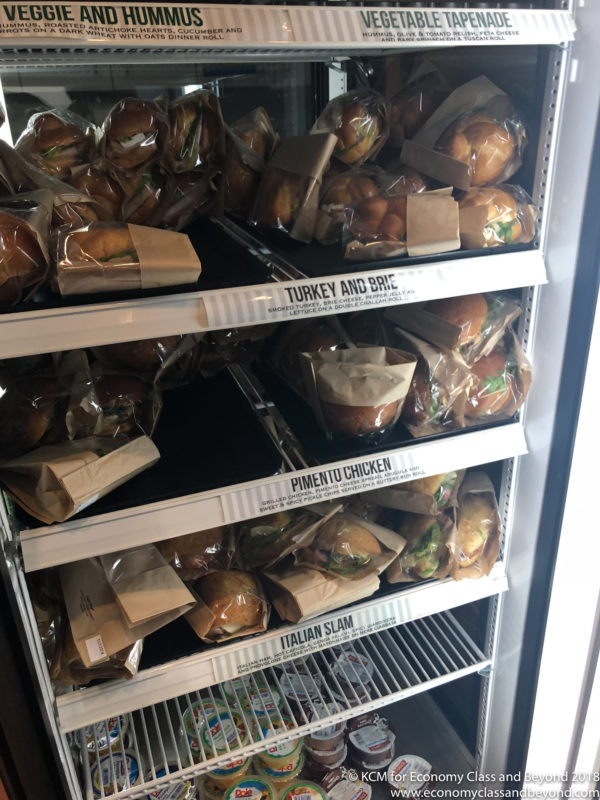 a shelf of food in plastic bags