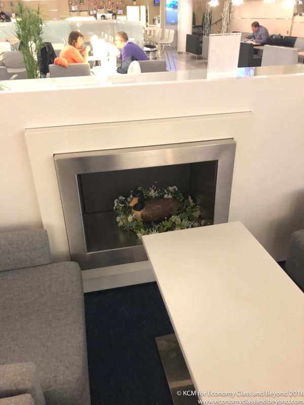 a fireplace with a duck on it