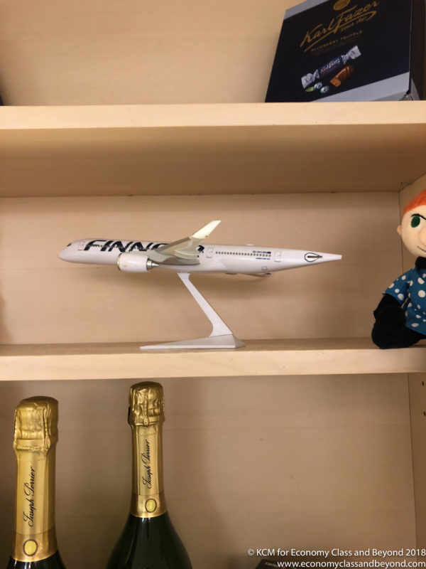 a toy airplane on a shelf