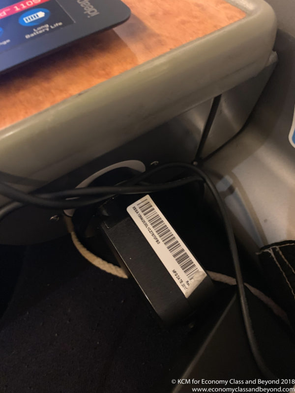 a black power cord with a bar code on it