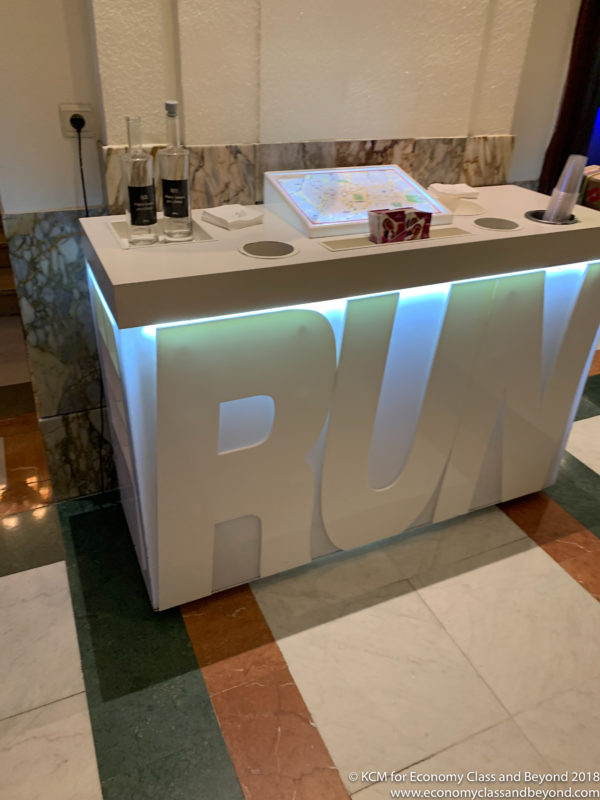 a white bar with a lighted sign