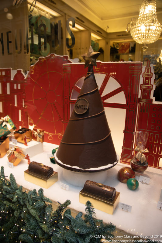 a chocolate tree shaped cake with a star on top