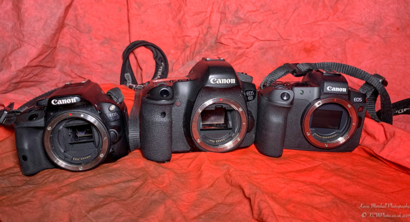 a group of black cameras