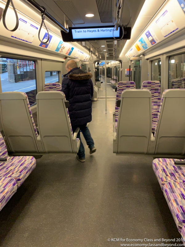 a man walking in a train