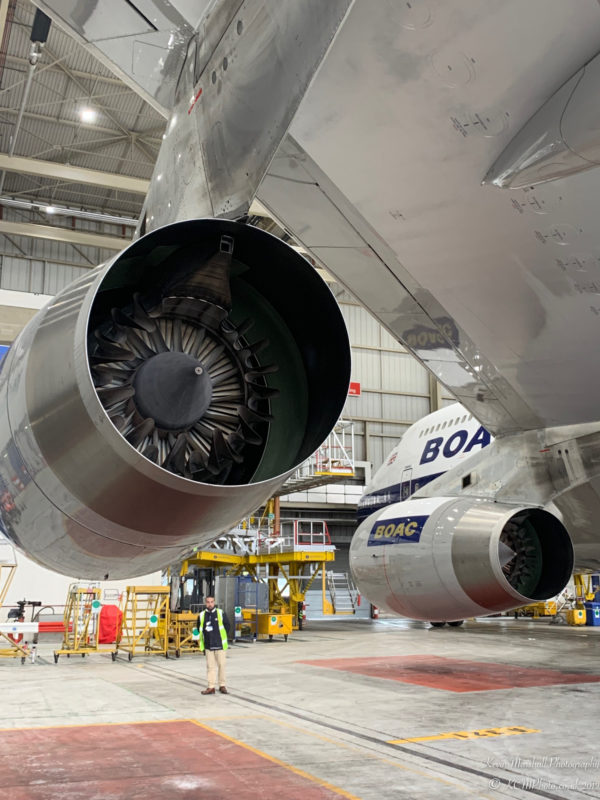 a large jet engine in a hangar