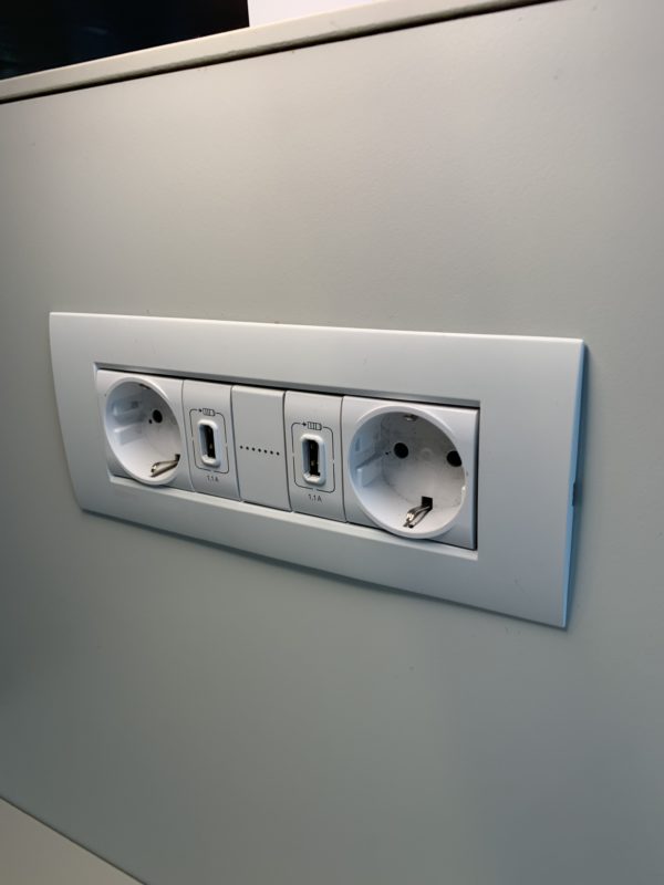 a white wall outlet with multiple outlets