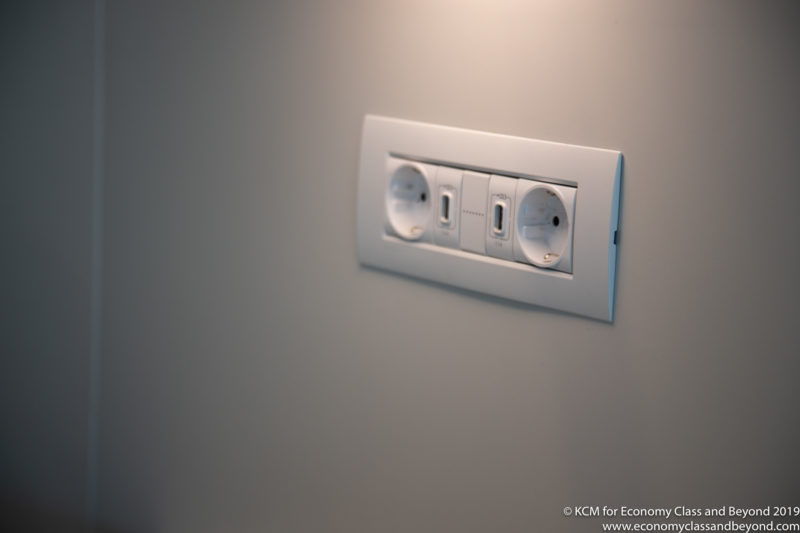 a white outlet on a wall