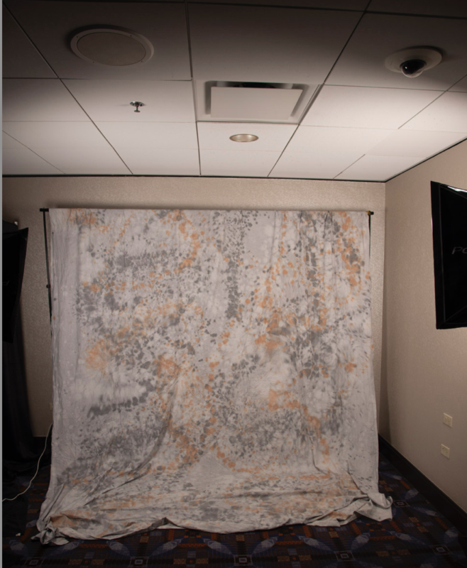 a photo studio with a cloth