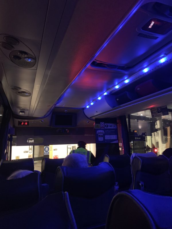 a bus with blue lights