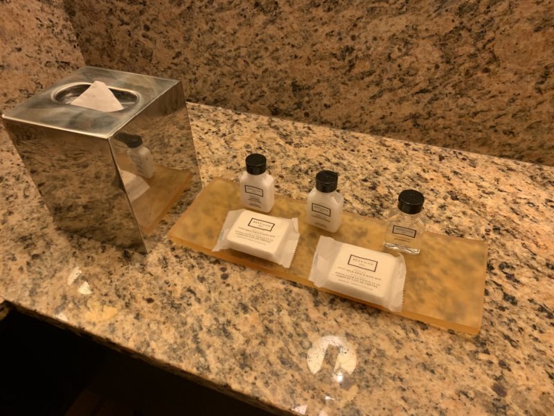 a group of small bottles on a counter