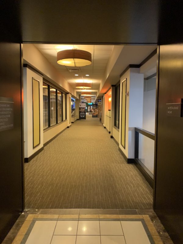 a hallway with a light fixture