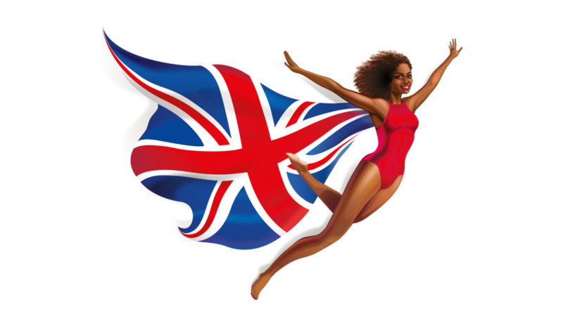 a woman in a swimsuit flying with a flag