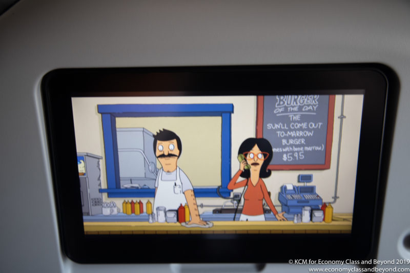 a cartoon of a man and woman in a kitchen