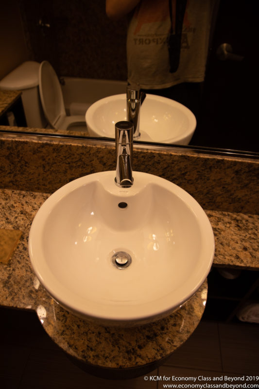 a sink with a faucet in the middle
