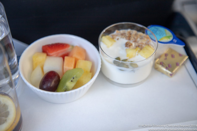 a bowl of fruit and yogurt