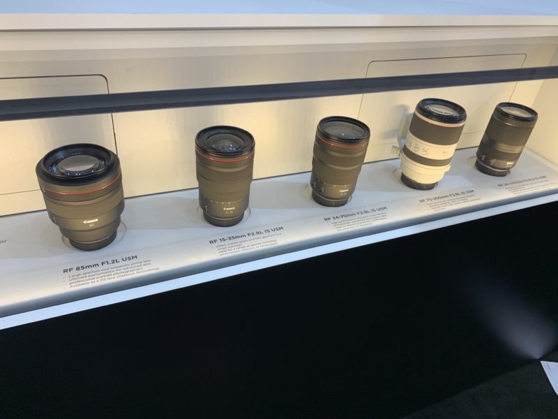 a row of camera lenses on a display