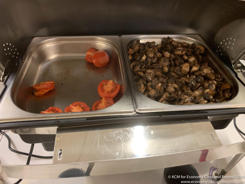 a trays of food in a container