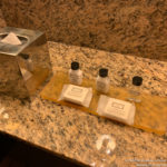 a group of small bottles on a counter