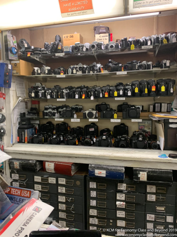 a shelf with cameras on it