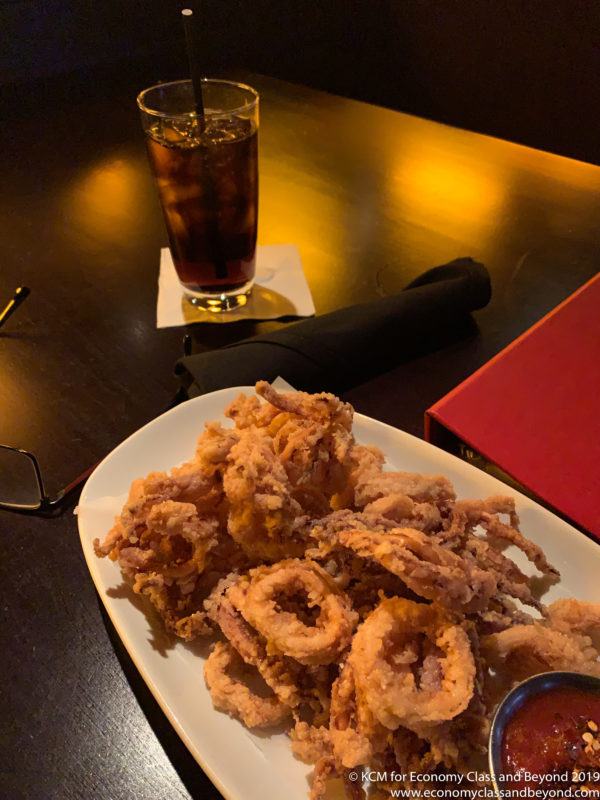 a plate of fried food on a table