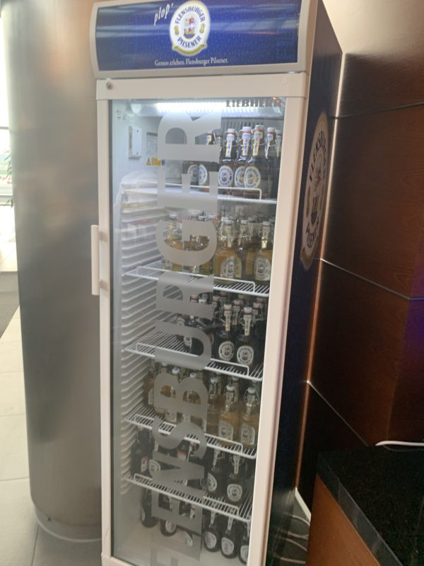 a refrigerator with a glass door