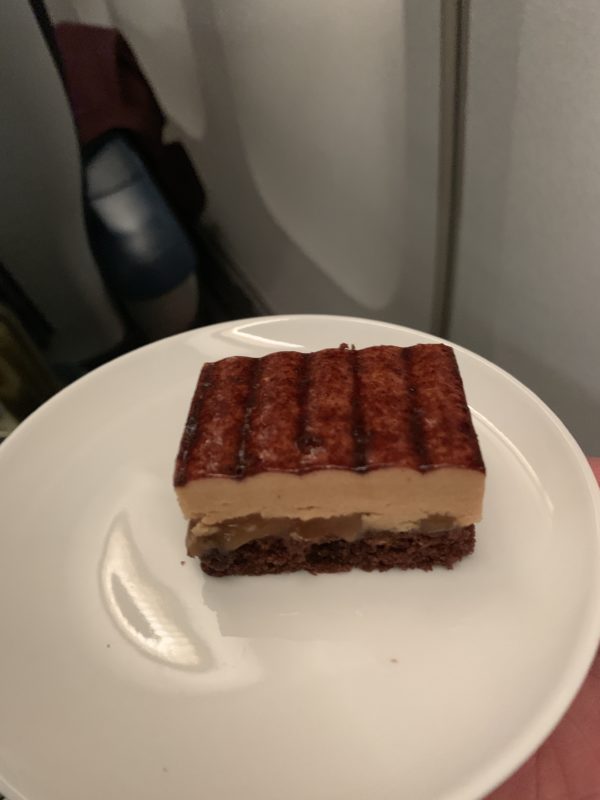 a plate of food on a plane