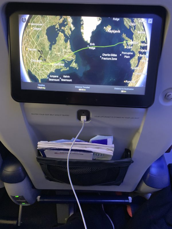 a screen on the back of a plane