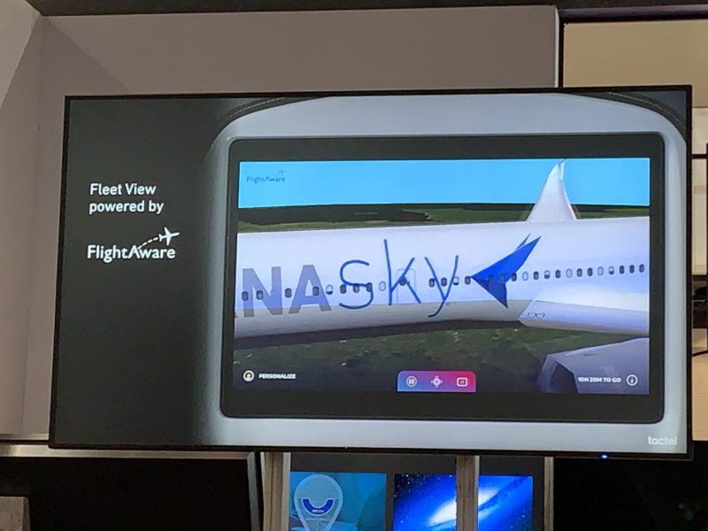 a screen with a picture of a plane